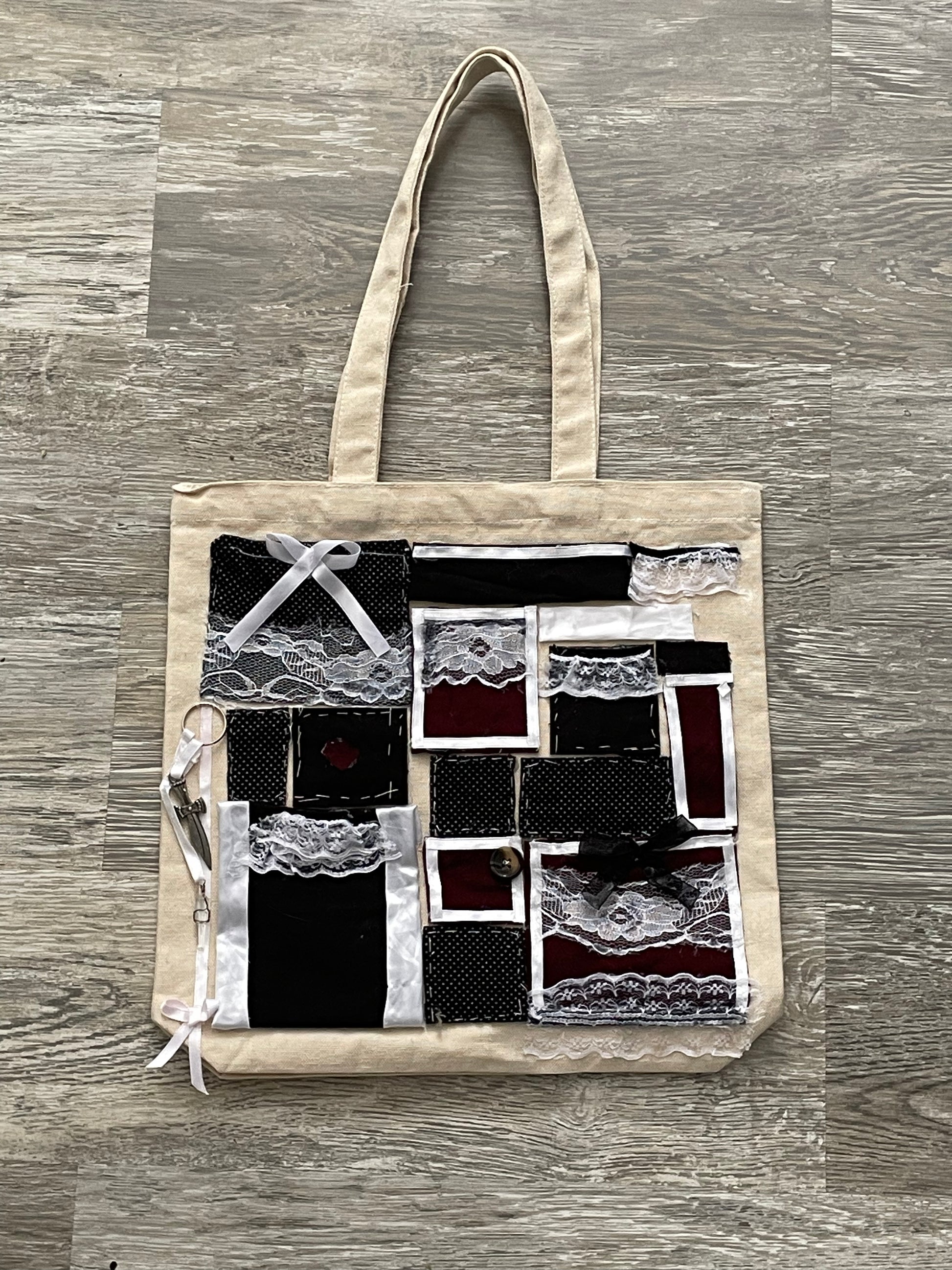 lace dark tote bag